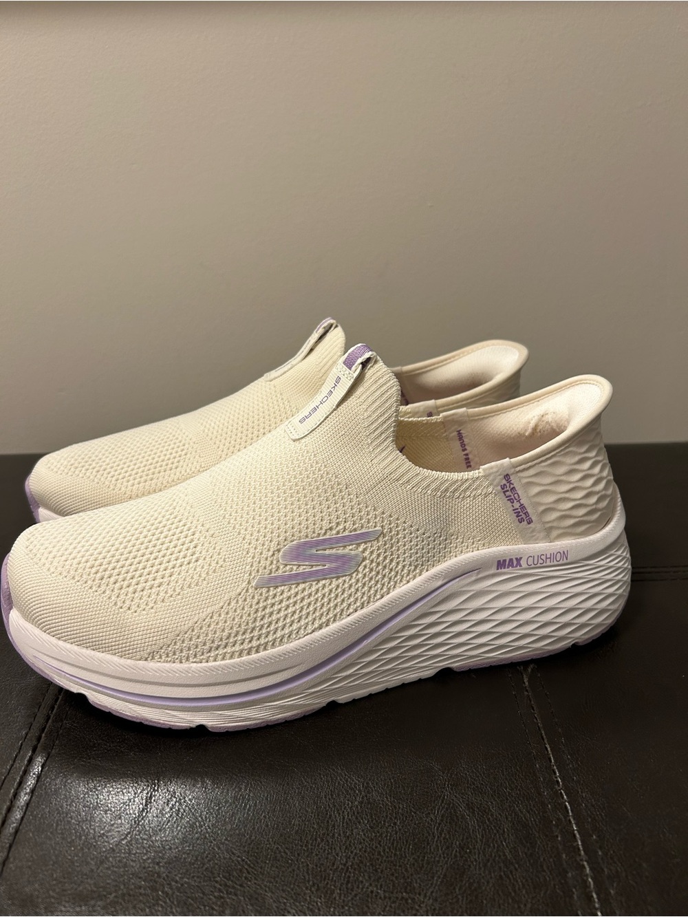Skechers Slip-On Sneakers in Cream with Lavender Accents